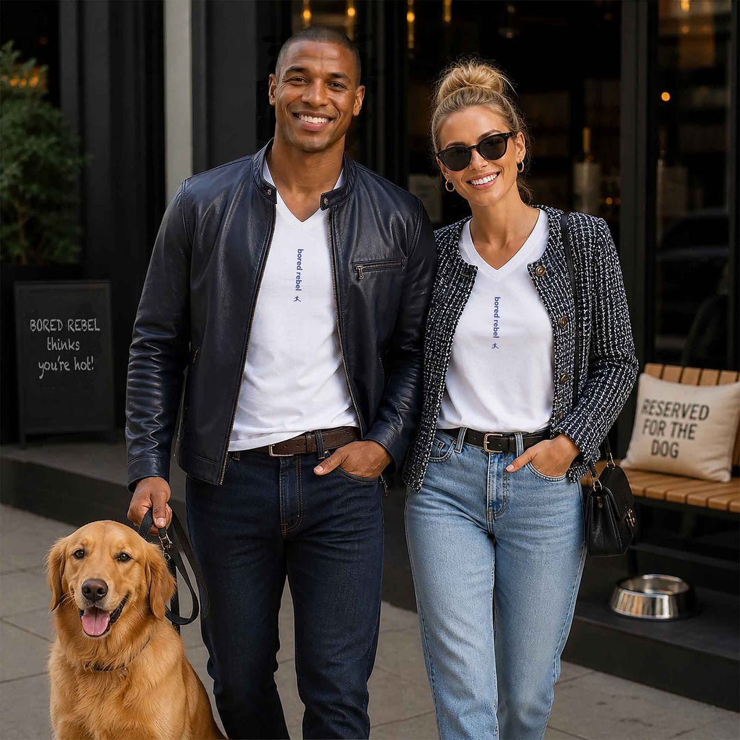 Man and woman each wearing minimalist Bored Rebel bored rebel v-neck graphic tee in upscale neighborhood
