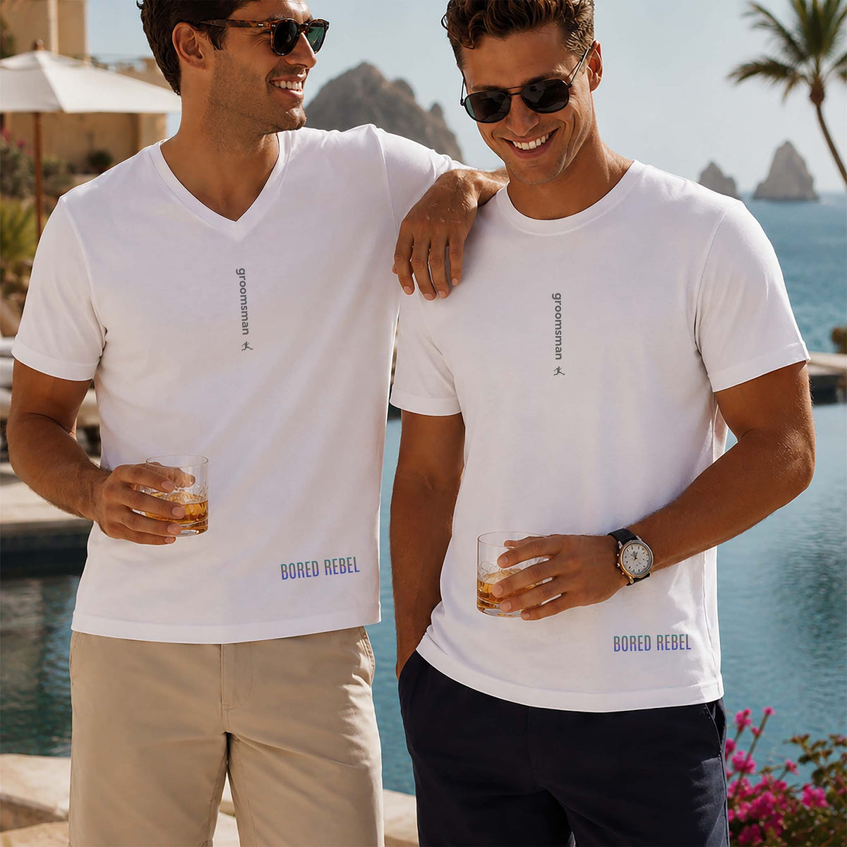 Two men at an upscale resort wearing white Bored Rebel Groomsman wedding T-shirts.