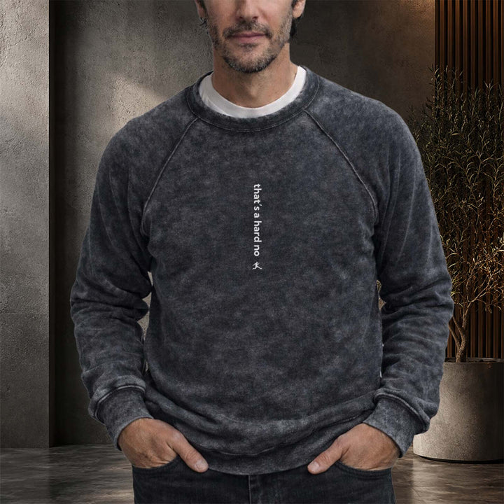 A man is wearing a Bored Rebel dark grey vintage wash sweatshirt. Vertical text centered on his chest reads "that&